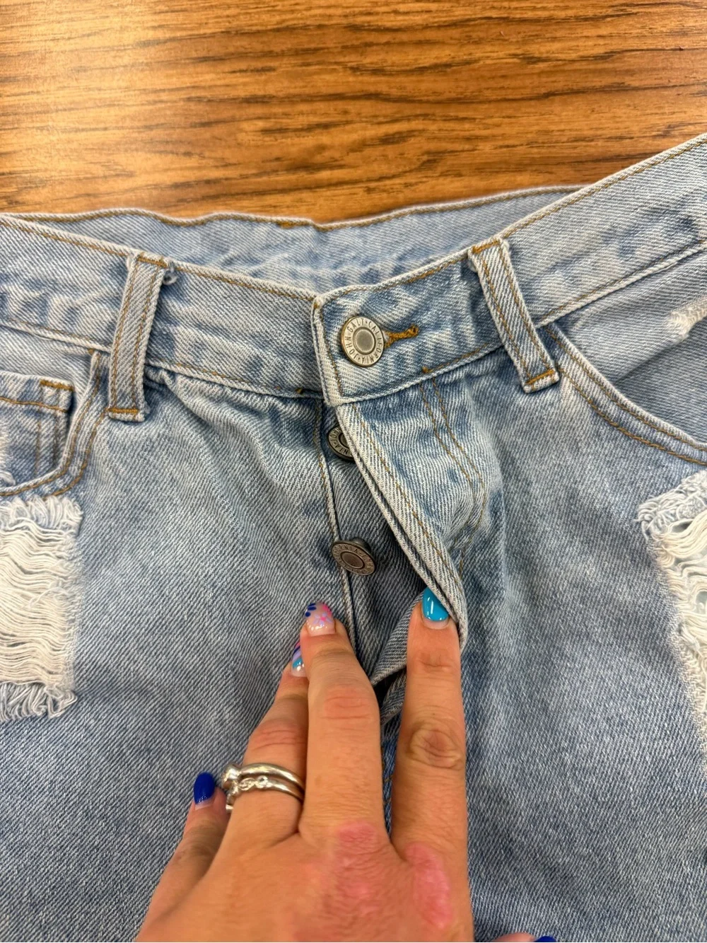 John Galt Jean shorts with intentional distressing and button fly